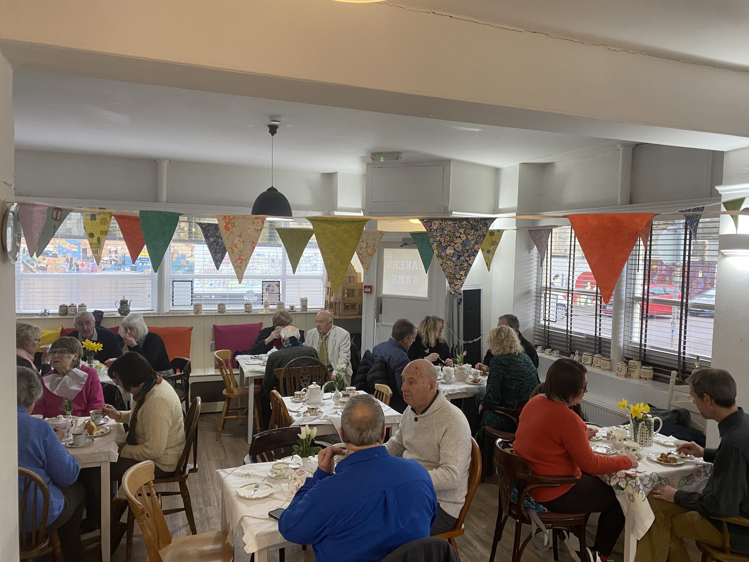 People enjoy afternoon tea in the Bakers